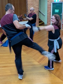 Luke and Olivia having fun sparring